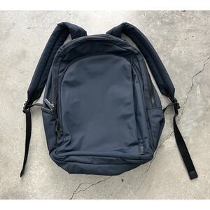 AWAY Travel The Everywhere Zip Backpack Navy Blue Laptop Drink Storage